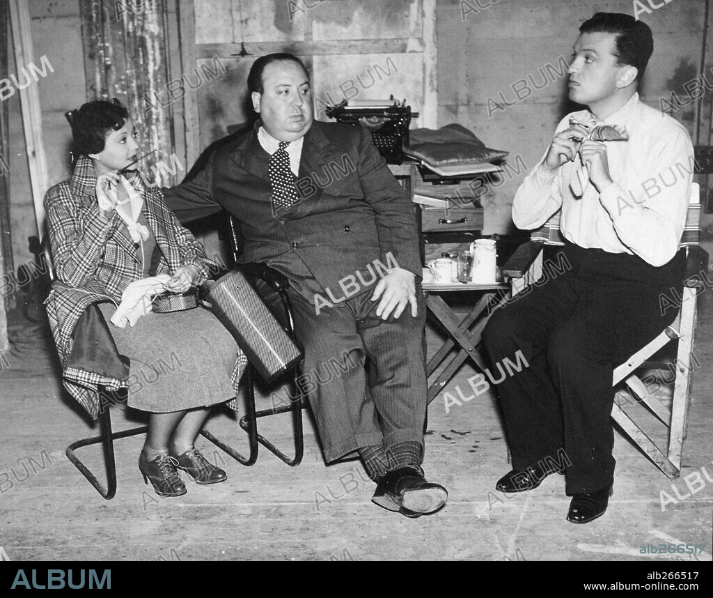 ALFRED HITCHCOCK, JOHN LODER y SYLVIA SIDNEY en SABOTAJE, 1936 (SABOTAGE), dirigida por ALFRED HITCHCOCK. Copyright GAUMONT-BRITISH.