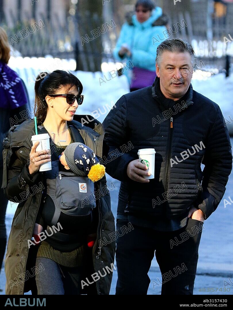 ALEC BALDWIN and HILARIA BALDWIN. Jan. 28, 2016 - New York City, NY, USA - Alec Baldwin and his wife Hilaria take their son Rafael for a walk as they fetch coffee on January 28 2016 in New York City. 28/01/2016