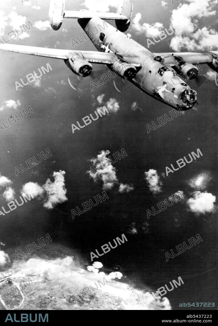 "Madame Pele" Spreads Pipe And Destruction On Moen Island. A veteran U.S. Liberator bomber, called "Madame Pele" in honor of the Hawaiian goddess of Volcanoes, heads for home after unloading its bombs over Moen Island on the Japanese-held atoll of Truk in the central Pacific. Smoke can be seen rising (bottom) from the enemy hangars and airstrip. The plane was financed through the proceeds of war bonds purchased by school children of Honolulu, capital city of Hawaii, and was named by them, Repeat.