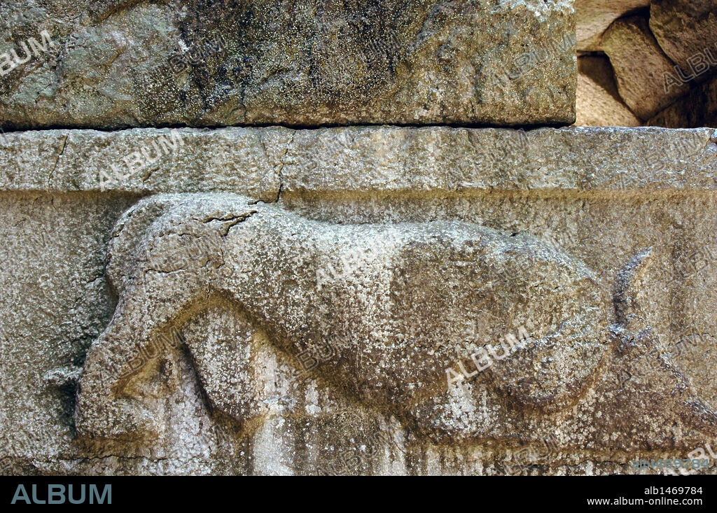 Cyclopean walls of the ancient city dating from IV century B.C. View of the gateway called Lion's Gate, one of the six entrances to the city. It shows a lion devouring a bull. Butrint. Republic of Albania.