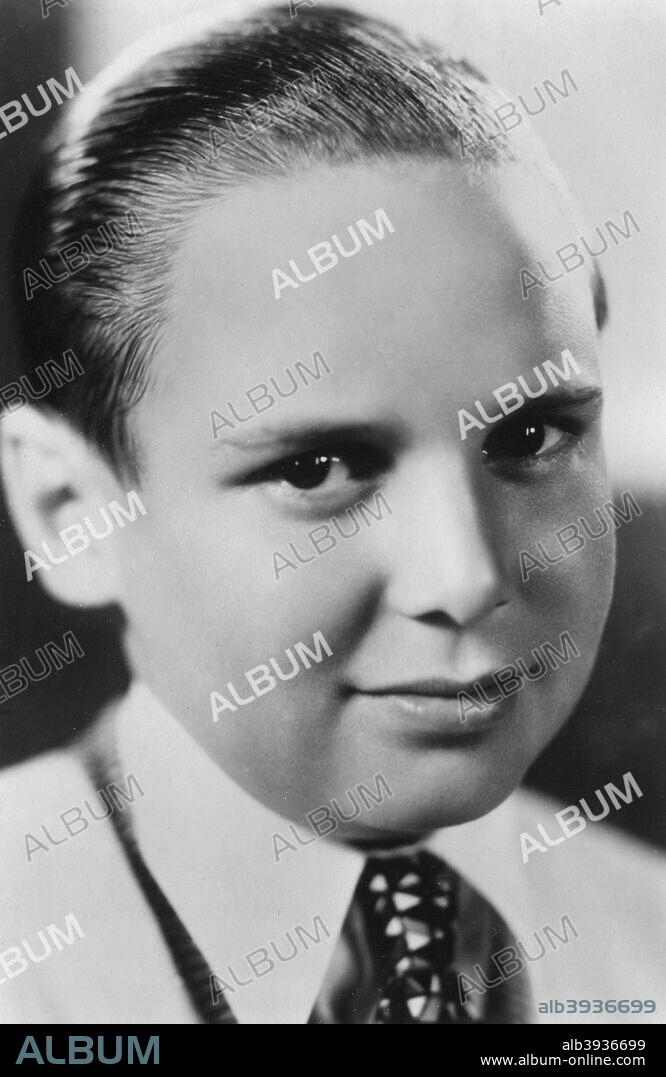 Jackie Coogan (1914-1984), American actor, 20th century. As a child actor, Coogan is best remembered for his role in Charlie Chaplin's classic The Kid (1921) and for the title role in Oliver Twist (1922), directed by Frank Lloyd. He was also the first star to get heavily merchandised, with peanut butter, stationery, whistles, dolls, records, and figurines just being a sample of the Coogan merchandise.