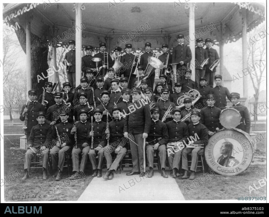 FRANCES BENJAMIN JOHNSTON. Carlisle Indian School, Carlisle, Pa. Band posed at the bandstand, 1901.