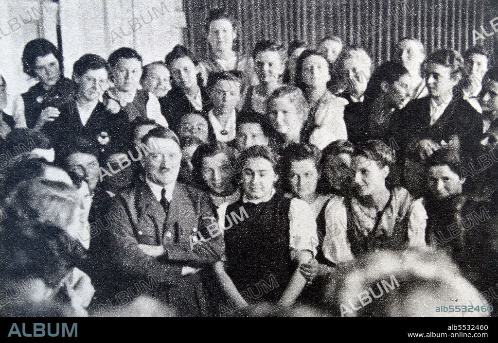Sing-song in Graz with Adolf Hitler, photographed by Heinrich Hoffmann. Heinrich Hoffmann (12 September 1885 - 15 December 1957) was Adolf Hitler's official photographer, and a Nazi politician and publisher, who was a member of Hitler's intimate circle.