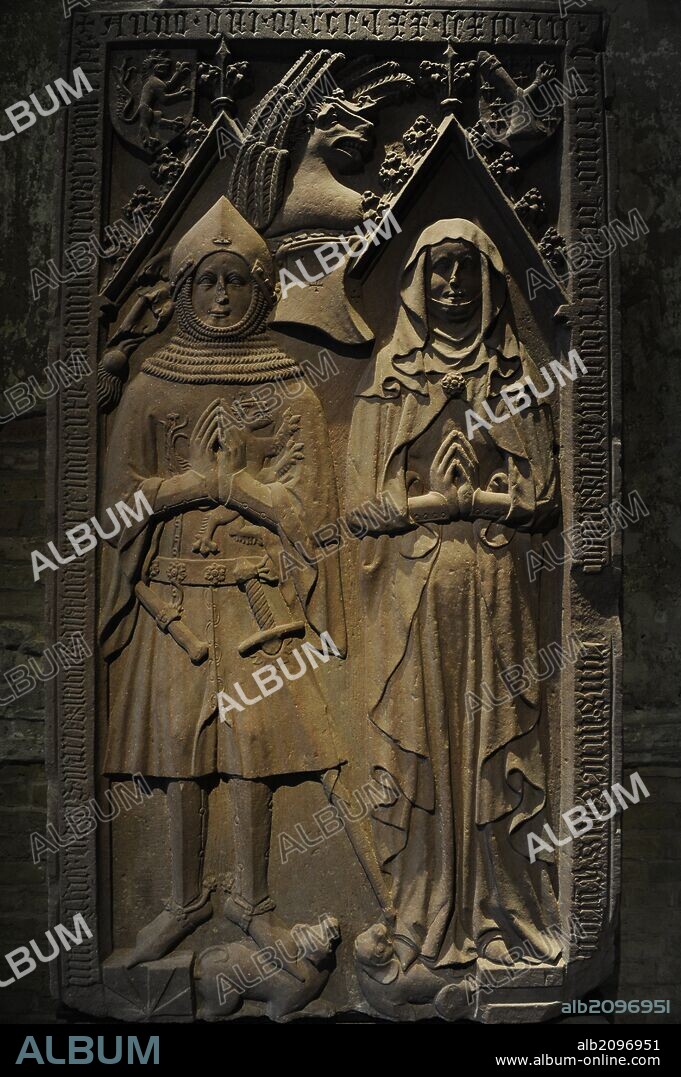 Tomb plate of Heinrich Beyer Boppard. Viscount of Boppard (d.1376) and his wife Lisa von Pyrmont (d.1399). From the Benedictine Monastery of Marienberg, 1399. Red Sandstone. Neues Museum (New Museum). Berlin. Germany.
