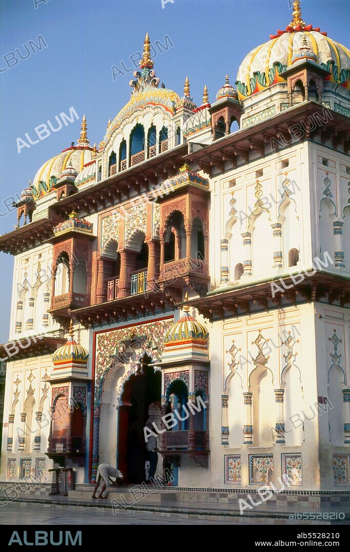 Janakpur's focal point is the magnificent Janaki Mandir, a temple devoted to Sita, the divine heroine of the Hindu epic Ramayana. The Indian sage Valmiki supposedly wrote the Ramayana – The Story of Rama – sometime between 500 and 100 BC. This major epic, some 48,000 lines long, is also well known in Sri Lanka, Burma, Thailand, Malaysia and Indonesia. The temple was built in 1911 by the Rani of Tikamagarh (Central India), at a cost of 900,000 Rupees – in those days a dizzying amount of money. In local parlance, the temple is also called Nau Lakh Mandir or 'Temple of 900,000 Rupees'. In 1657, a golden statue of the Goddess Sita was found at the very spot, and Sita is also said to have lived there – indeed, another name for Sita is Janaki.