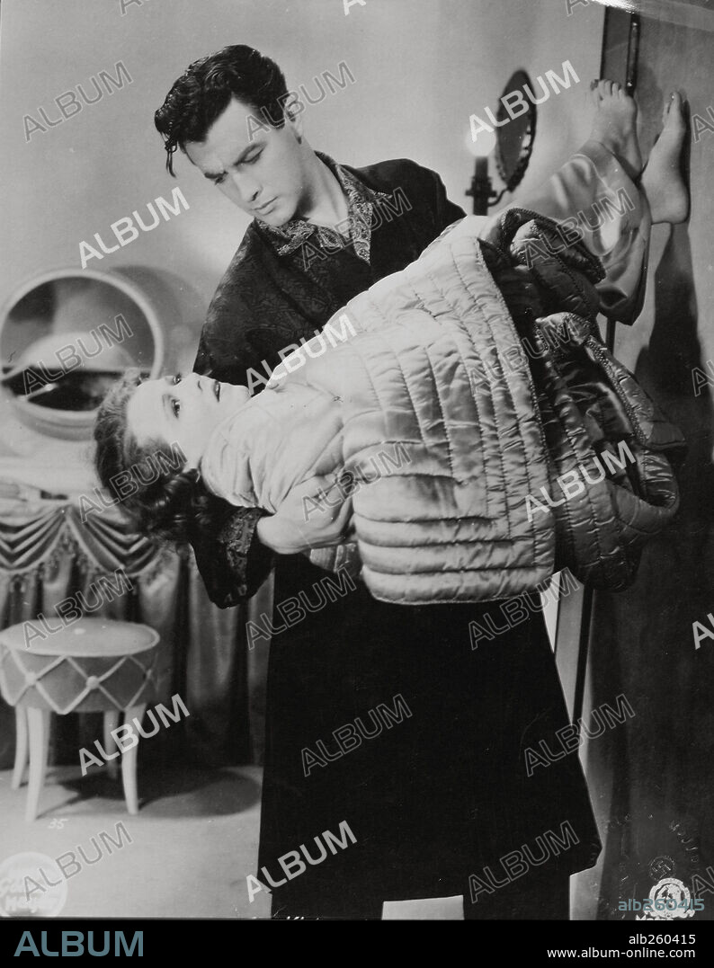 JANET GAYNOR and ROBERT TAYLOR in SMALL TOWN GIRL, 1936, directed by WILLIAM A. WELLMAN. Copyright M.G.M.