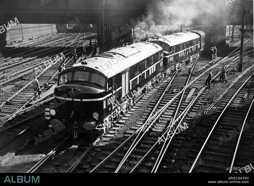 Train Diesel Electric. The two first Diesel Electric locomotives pulling the passenger train from Euston Station. 5th October 1948.