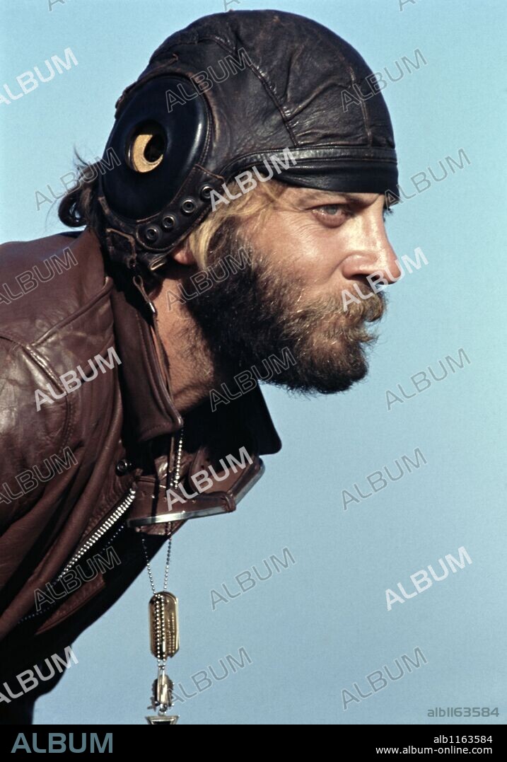 DONALD SUTHERLAND in KELLY'S HEROES, 1970, directed by BRIAN G. HUTTON. Copyright M.G.M.