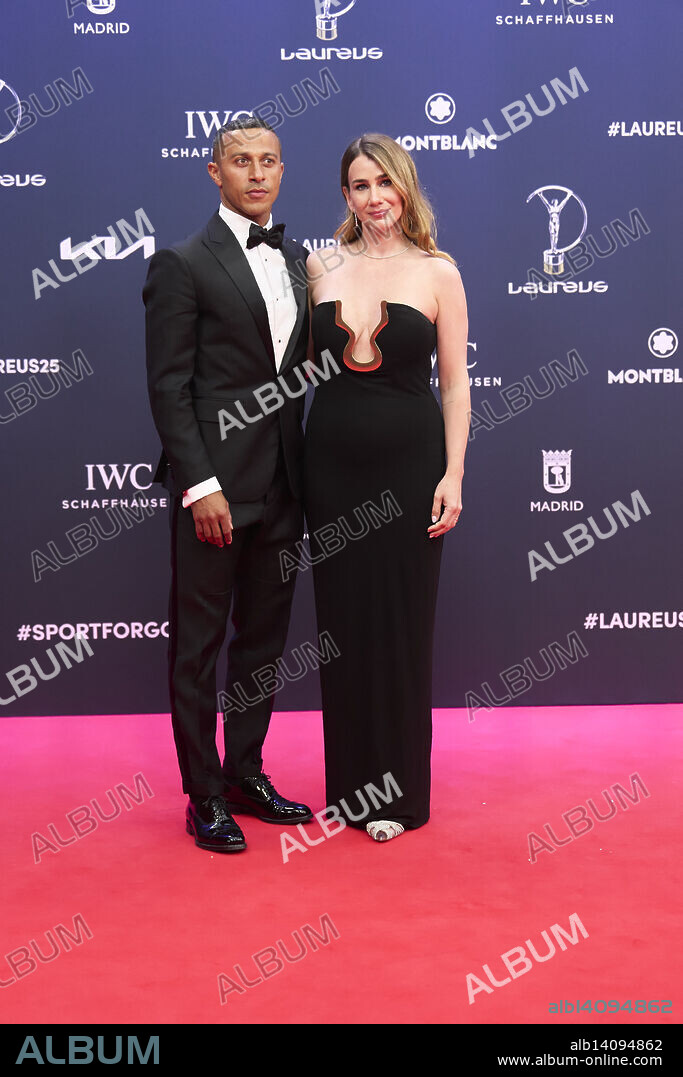 Thiago Alcantara, Julia Vigas attends 25th Anniversary Laureus World Sports Awards - Red Carpet at Palacio de Cibeles on April 21, 2025 in Madrid, Spain.