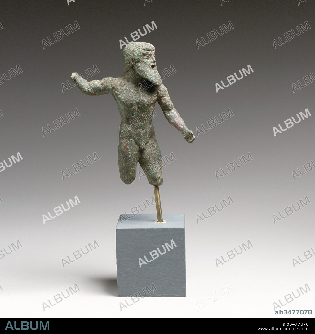 Bronze statuette of Zeus or Poseidon, Archaic, early 5th century B.C., Greek, Bronze, H. 4 1/8 in. (10.5 cm), Bronzes, This mature bearded figure must represent either Zeus, the god of the sky and ruler of the Olympian deities, or his brother Poseidon, who controlled the seas. The identity would have been clear from the attribute that was originally held in the right hand.