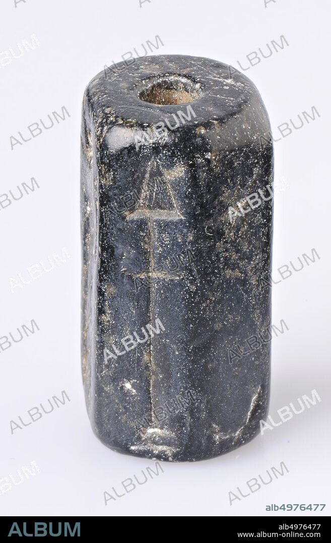 F: star and crescent moon, spade with handle, pleading goddess (?), Tree, follower and other character, coil seal, serpentine, Color: black, Form: cylinder, Processing:, Method: L. 30 mm , Diam. 16 mm, Neo Babylonian Period (?).