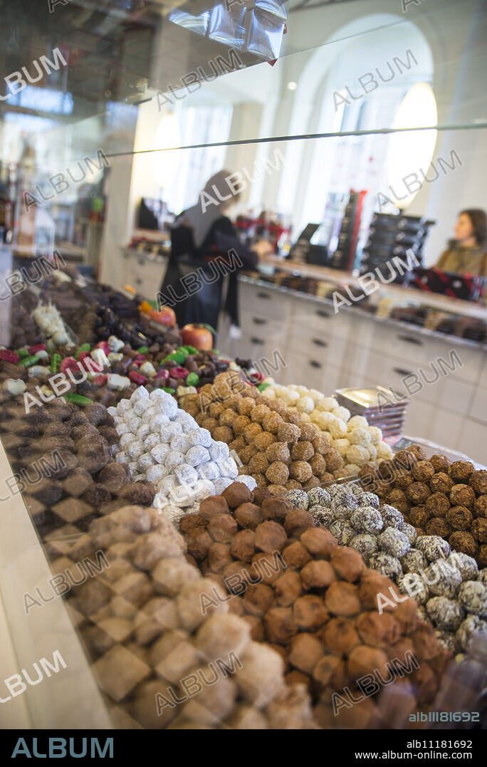 Dumon chocolate shop, Simon Stevinplein Square, Bruges, Belgium, Europe.
