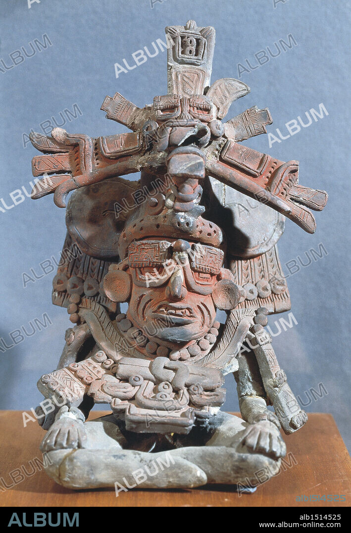 Zapotec civilization, Mexico, 6th century A.D. Anthropomorphic clay funerary urn depicting the Old God, Monte Alban style.