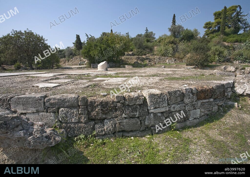The Tholos (Skias) in the Greek Agora of Athens, Greece. At the southwest side of the agora in Athens, and as part of the Bouleuterion complex, stood the Tholos, a round temple, eighteen metres in diameter, which served as the seat of the Prytaneis of Athens. It was built around 470 BC by Cimon, to serve as a dining hall for the boule (members of the senate).
