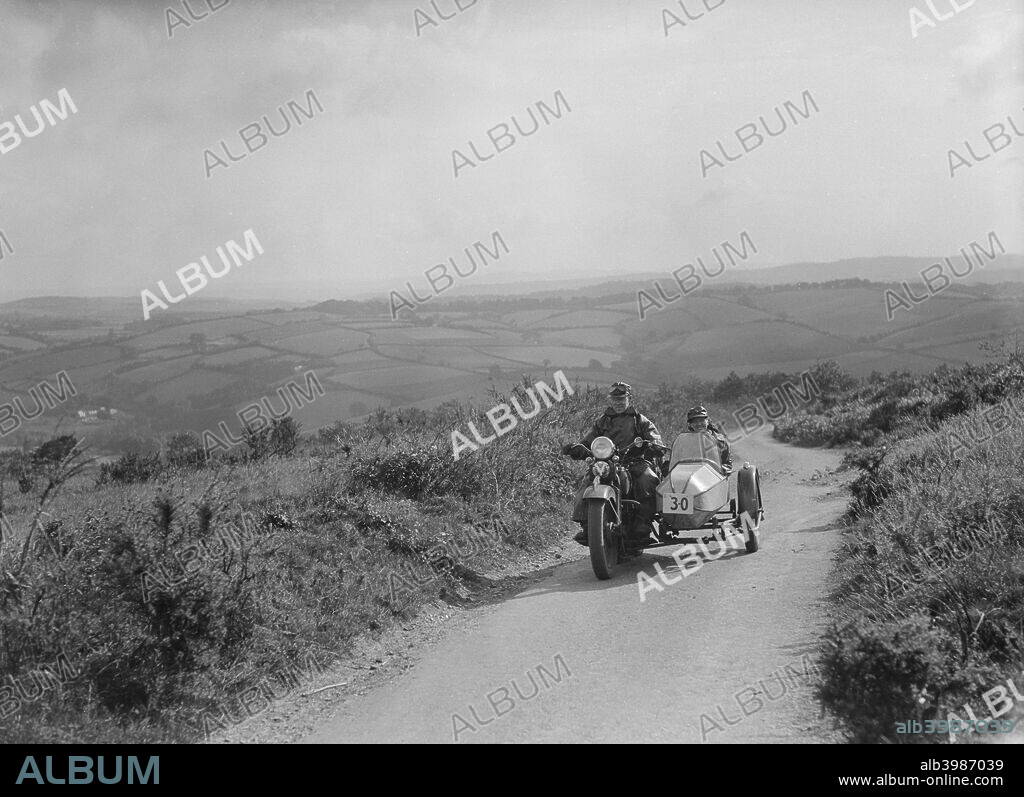 Harley-Davidson & s/car 1208 cc.  Event Entry No: 30 Rider: Praill, R.W. Award: Premier. Place: M.C.C. Torquay Rally. Date: 15/16.7.38.