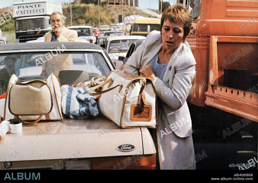 ANNIE GIRARDOT y FERNANDO REY en EL GRAN ATASCO, 1979 (L' INGORGO-UNA STORIA IMPOSSIBILE), dirigida por LUIGI COMENCINI. Copyright ALBATROS/GAUMONT/GREENWICH FILMS/FILMEDIS/JOSE FRADE PROD.