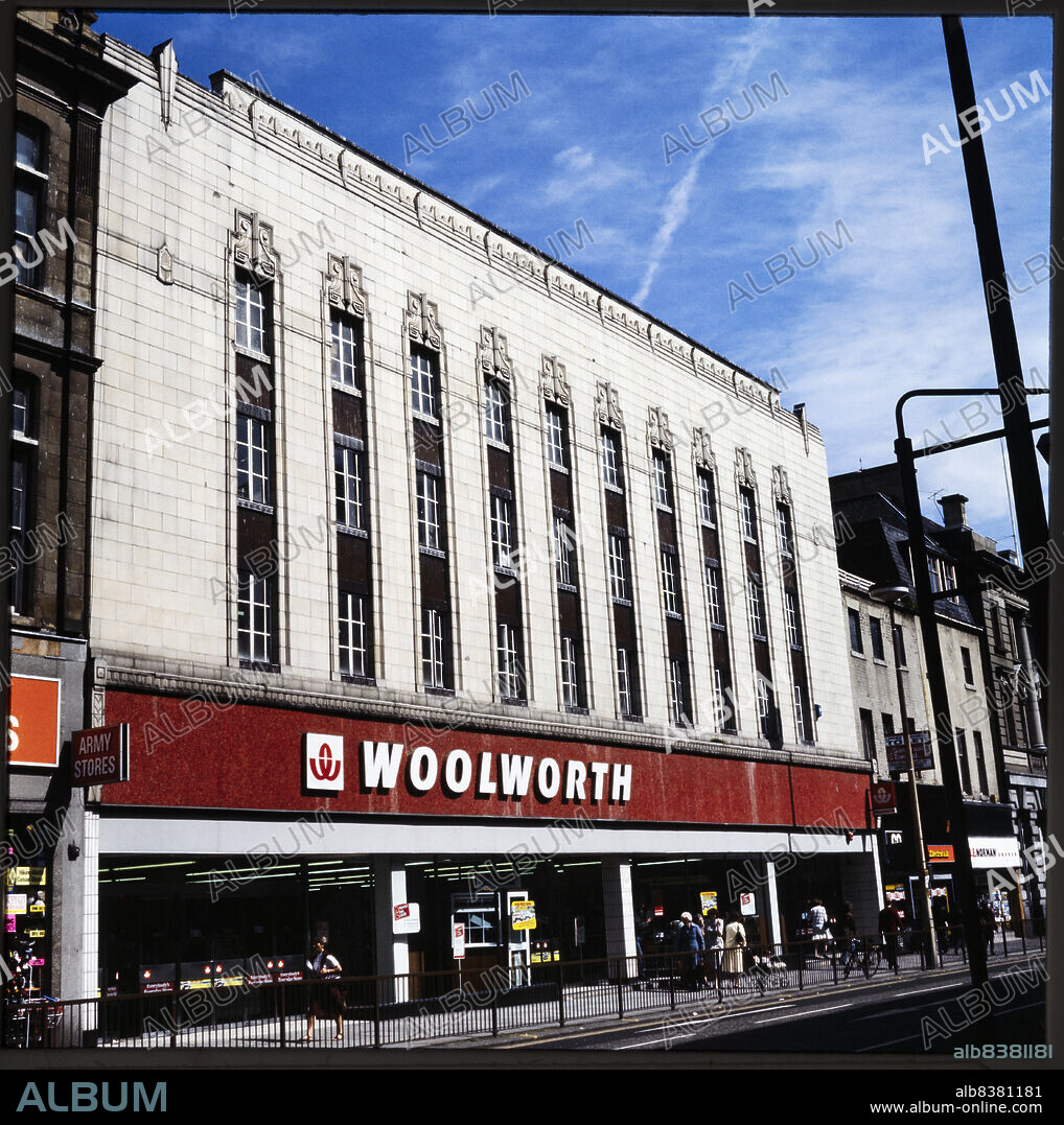 NICHOLAS ANTHONY JOHN PHILPOT. FW Woolworth and Co Ltd, 7-10 Fawcett Street, Sunderland, 1970s-1980s.The front elevation of the Woolworth's store at 7-10 Fawcett Street. The Woolworth's store on Fawcett Street was numbered store 144. It opened in 1923, although the Art Deco facade was added in 1930s. The store closed in 2004 and subsequently became a Primark store. From 2016, the premises were occupied by the fashion retailer Flannels.