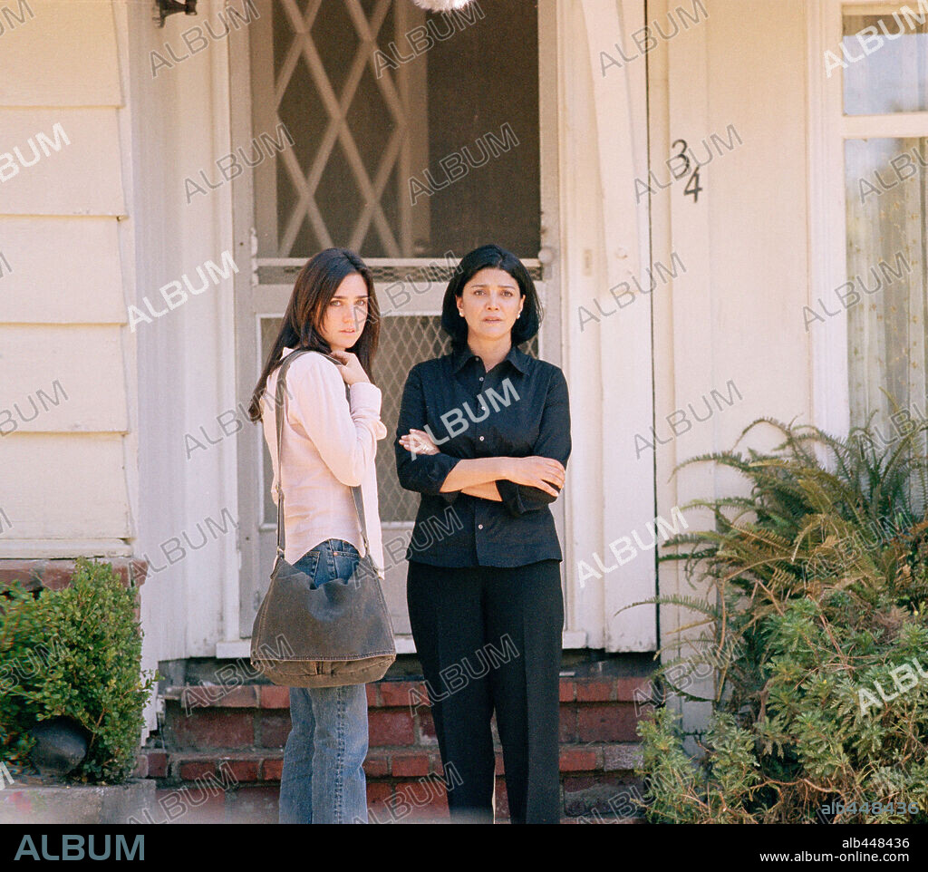 JENNIFER CONNELLY and SHOHREH AGHDASHLOO in HOUSE OF SAND AND FOG, 2003, directed by VADIM PERELMAN. Copyright DREAMWORKS / BIRMELIN, BRUCE.