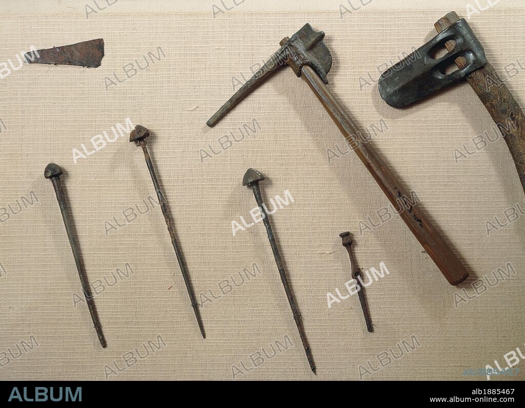 Tools, axes and iron nails from Mari (now Tell Hariri) archeological site, Syria. Assyrian civilisation, 2nd Millennium BC.
