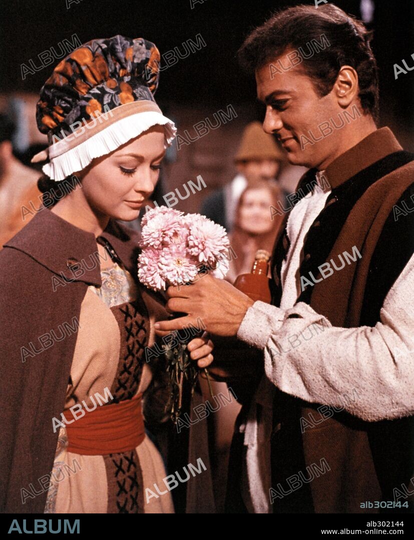 CHRISTINE KAUFMANN and TONY CURTIS in TARAS BULBA, 1962, directed by J. LEE THOMPSON. Copyright UNITED ARTISTS.