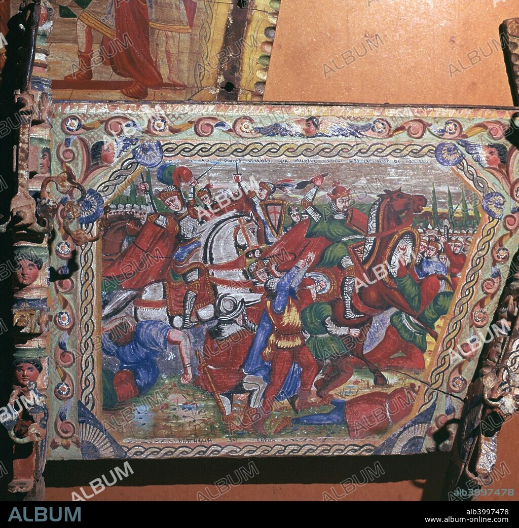 Depiction of the battle of Capua in 1501, showing it being stormed by Cesare Borgia, on a traditional Sicilian painted cart in Palermo, 16th century.