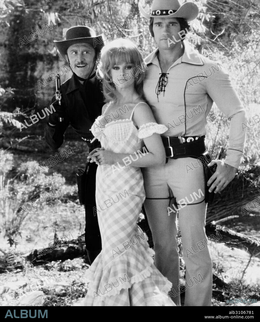 ANN-MARGRET, ARNOLD SCHWARZENEGGER and KIRK DOUGLAS in THE VILLAIN, 1979, directed by HAL NEEDHAM. Copyright COLUMBIA/RASTAR.