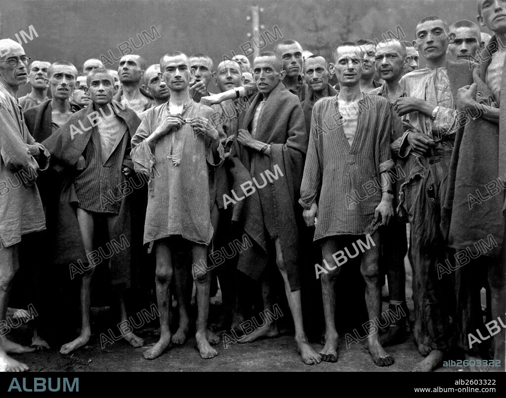 Male prisoners of war, celebrating their survival and liberation from the Berga Concentration Camp. Dated in 1945, at the end of the Second World War.