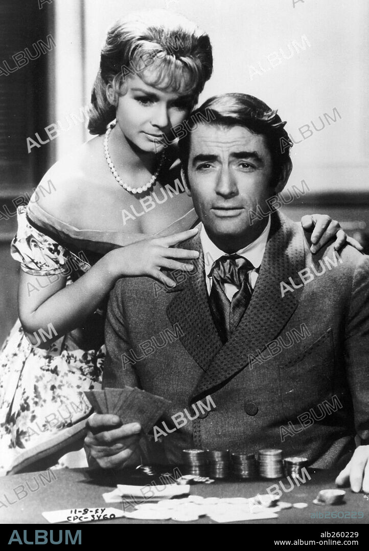 DEBBIE REYNOLDS and GREGORY PECK in HOW THE WEST WAS WON, 1962, directed by GEORGE MARSHALL, HENRY HATHAWAY, JOHN FORD and RICHARD THORPE. Copyright M.G.M/CINERAMA.