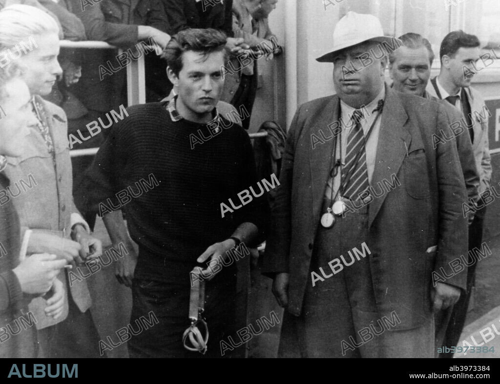 Alfred Neubauer, c1954-c1955. Neubauer (with hat), took over as manager of the Mercedes-Benz racing team, bringing in many innovative practices and presiding over its many successes until 1955. The company pulled out of racing in 1955 after one of their cars was involved in a disastrous crash at Le Mans, and Neubauer retired shortly afterwards.