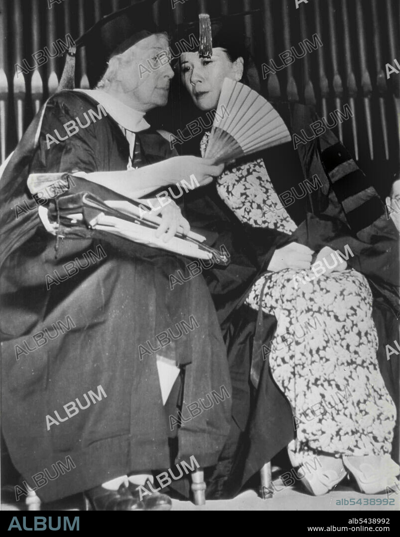 Madame Chiang Meets An Old Friend - Madame Chiang Kai-Shek (Right) sat in intimate conversation Yesterday with Mrs.W.N. Ainsworth, An old friend, in the Chapel Of Wesleyan college which gave the wife of the Chinese Generalissimo a degree of Doctor of Laws. They were  friends in China Many years ago when Mrs. Ainsworth's Husband, the late Bishop W.N. Ainsworth, was head of Methodist missions there. June 27, 1943. (Photo by AP Wirephoto);Madame Chiang Meets An Old Friend - Madame Chiang Kai-Shek.