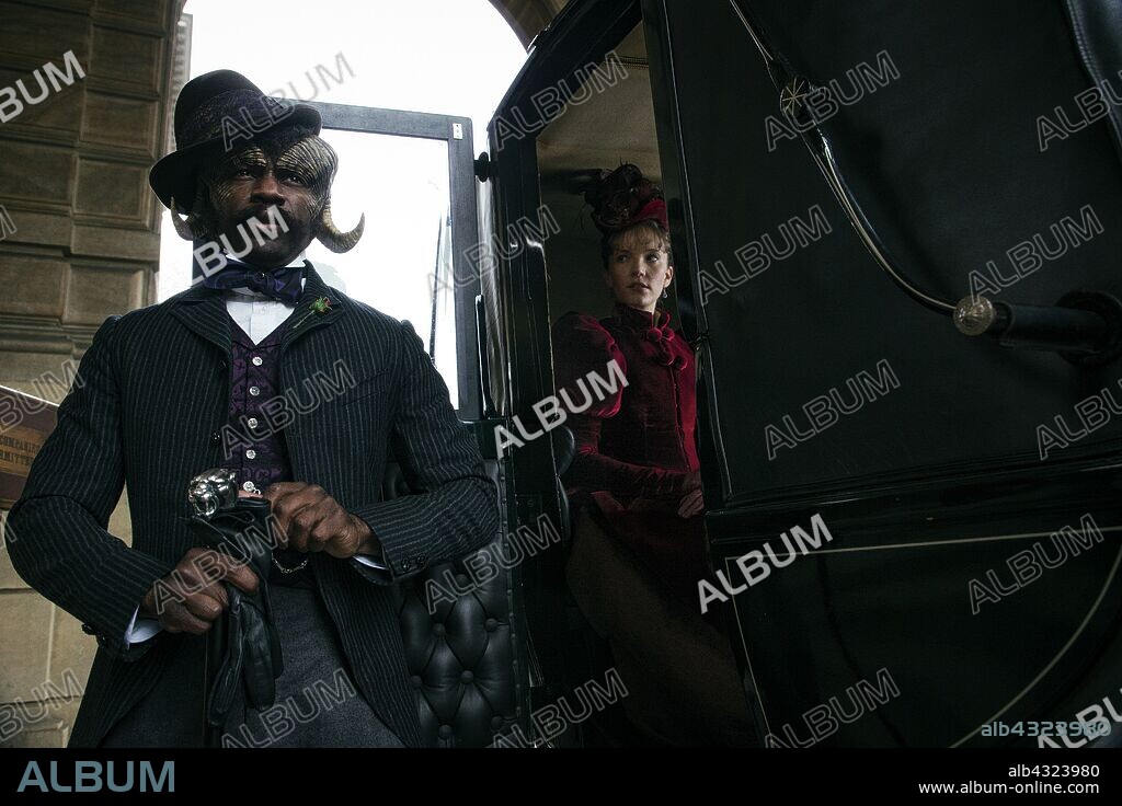 DAVID GYASI and TAMZIN MERCHANT in CARNIVAL ROW, 2019, directed by ANDY GODDARD, ANNA FOERSTER, JON AMIEL and THOR FREUDENTHAL. Copyright AMAZON STUDIOS.