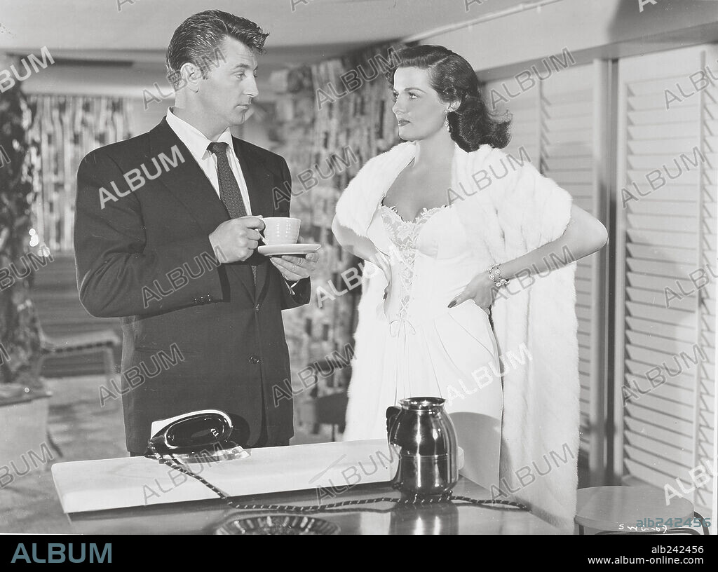 JANE RUSSELL y ROBERT MITCHUM en FRONTERAS DEL CRIMEN, 1951 (HIS KIND OF WOMAN), dirigida por JOHN FARROW. Copyright RKO.