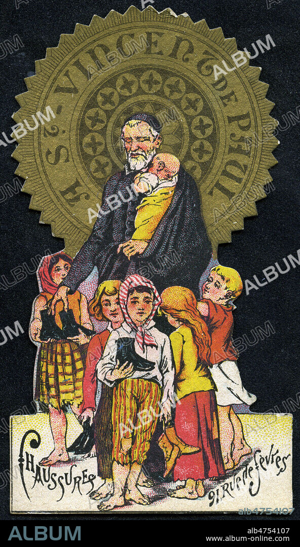 Carte publicitaire vers 1900 pour le magasin de chaussures 'Saint Vincent de Paul' : le saint offre des souliers a des enfants demunis. Illustration anonyme. Credit : Collection IM/KHARBINE-TAPABOR.