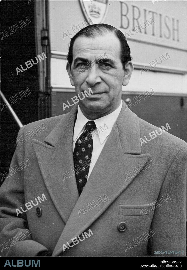 Maurice Winnick Dusseldorf Bound -- Maurice Winnick at London Airport today (Wednesday) just prior to departure for Dusseldorf. Famous figure of the world of entertainment Maurice Winnick today (Wednesday) left London Airport by BEA on route for Dusseldorf. December 22, 1954. (Photo by Reuterphoto).