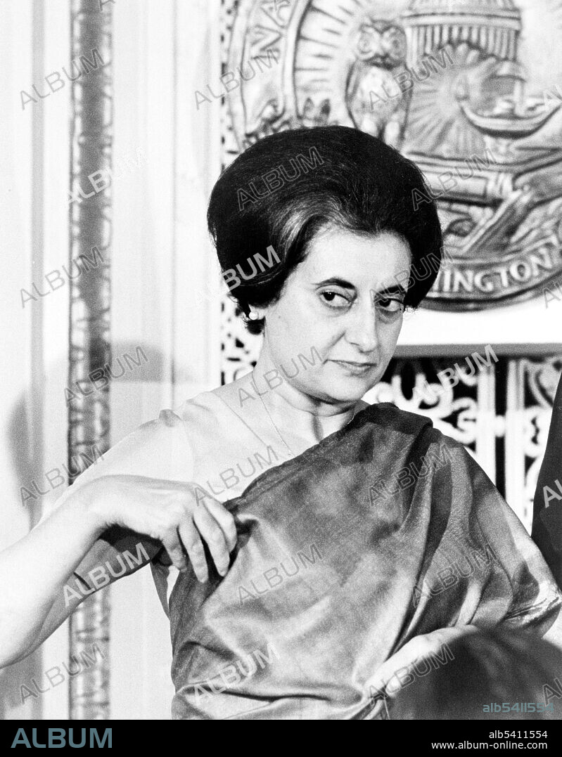 Prime Minister Indira Gandhi of India at the National Press Club, Washington, D.C. Indira Priyadarshini Gandhi (November 19, 1917 - October 31, 1984) was Prime Minister of India. She was the only child of the first Indian Prime Minister, Jawaharlal Nehru. She served as the Chief of Staff of her father's administration between 1947-64. Upon her father's death in 1964, Gandhi became a cabinet minister in the government led by Lal Bahadur Shastri. In Congress' party parliamentary leadership election held in early 1966, she defeated her rival, Morarji Desai, to become leader and succeed Shastri as the prime minister of India. As the Prime Minister of India, Gandhi was known for her political ruthlessness and unprecedented centralization of power. She went to war with Pakistan in support of the independence movement and war of independence in East Pakistan, which resulted in an Indian victory and the creation of Bangladesh, as well as increasing India's influence to the point where it became the regional hegemon of South Asia. Gandhi presided over a controversial state of emergency from 1975-77 during which she ruled by decree. She was assassinated in 1984, at the age of 66, by her Sikh bodyguards. She is the second-longest-serving Prime Minister of India and the only woman to hold the office. Photographed by Warren K. Leffler, March 29, 1966. U.S. News & World Report Magazine Photograph Collection.