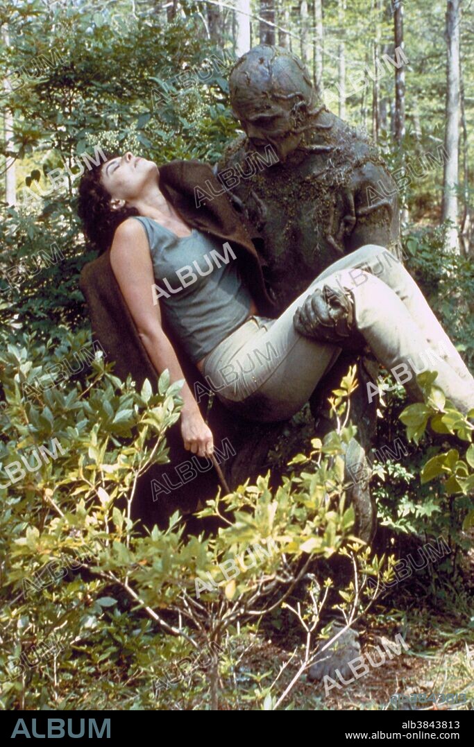 ADRIENNE BARBEAU and DICK DUROCK in SWAMP THING, 1982, directed by WES CRAVEN. Copyright SWAMPFILMS.