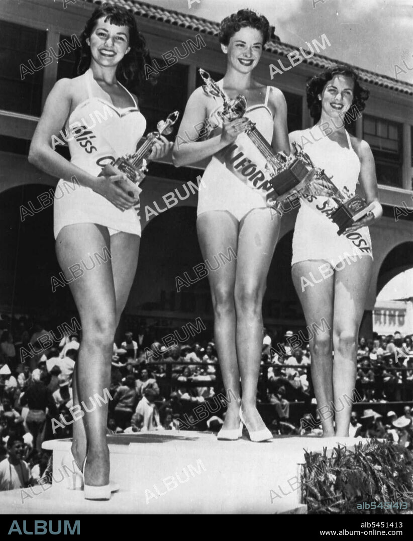 Miss California Winners - Barbara Jane Harris, 20, a native of Colorado, representing Watsonville, centre, was crowned Miss California of 1955 here today before 30,000 spectators. Her statistics: a brownette, 5 feet 6 1/2 inches, 120 pounds, 34 1/2, 23 1/2, Oakland. Rheua Chase, 18, right, as Miss San Jose, placed third. June 26, 1955. (Photo by AP Wirephoto).