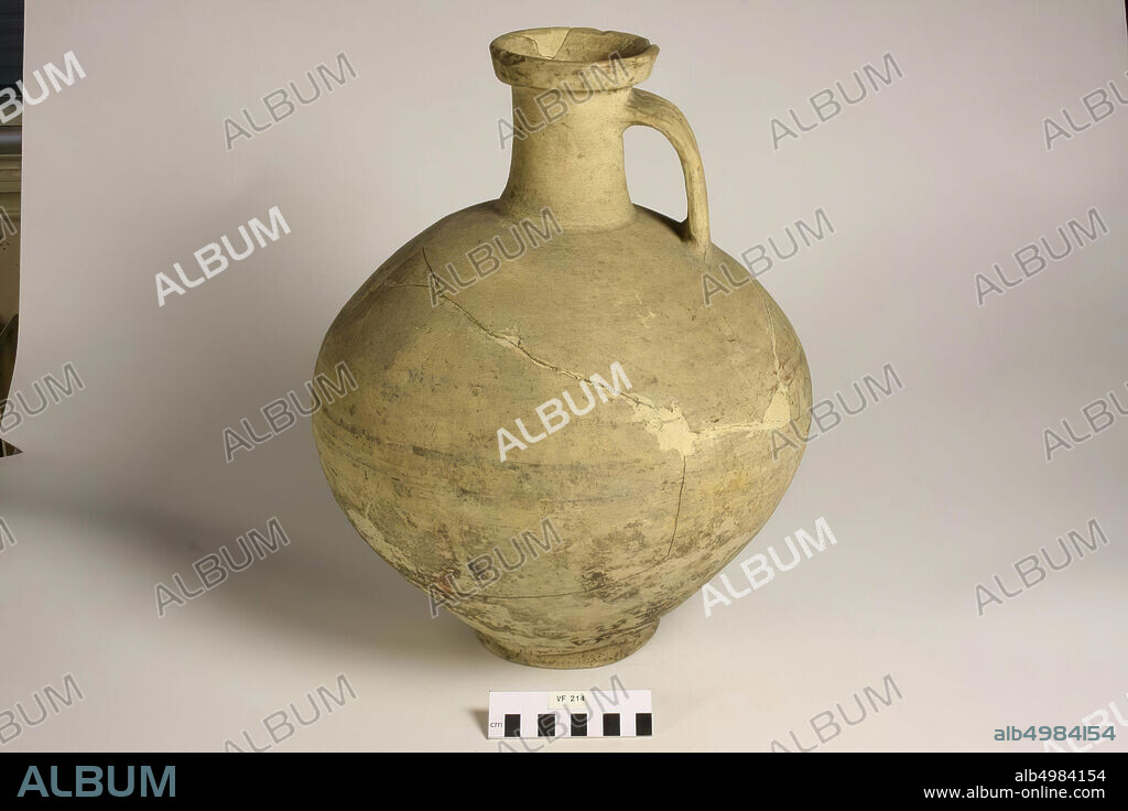 Large Roman jar of convex shape with sharply separated cylindrical neck and rim and separate stand ring, the ear slightly curved between neck and belly, all parts of the jar individually speaking. Various glueing and some additions., Jug, earthenware, h: 40 cm, diam: 33 cm, roman Ca. 30 AD, the Netherlands, Utrecht, Bunnik, Vechten.