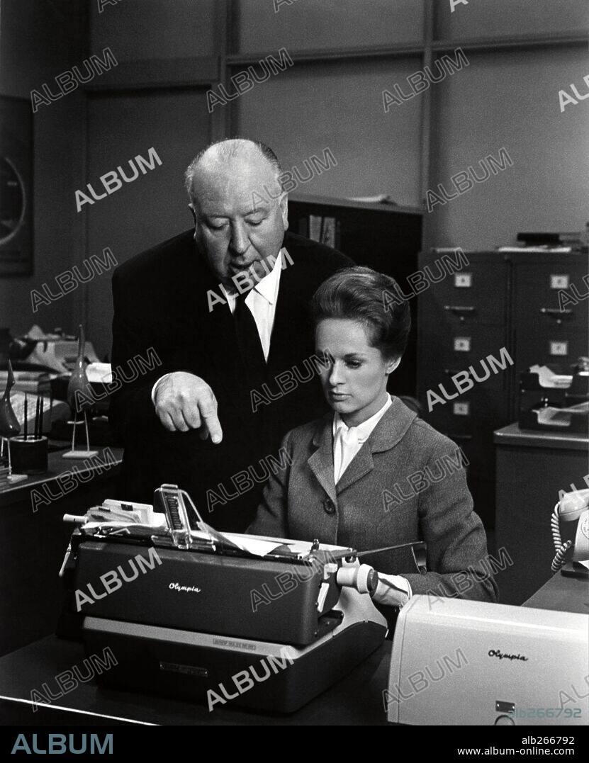 ALFRED HITCHCOCK and TIPPI HEDREN in MARNIE, 1964, directed by ALFRED HITCHCOCK. Copyright UNIVERSAL PICTURES.