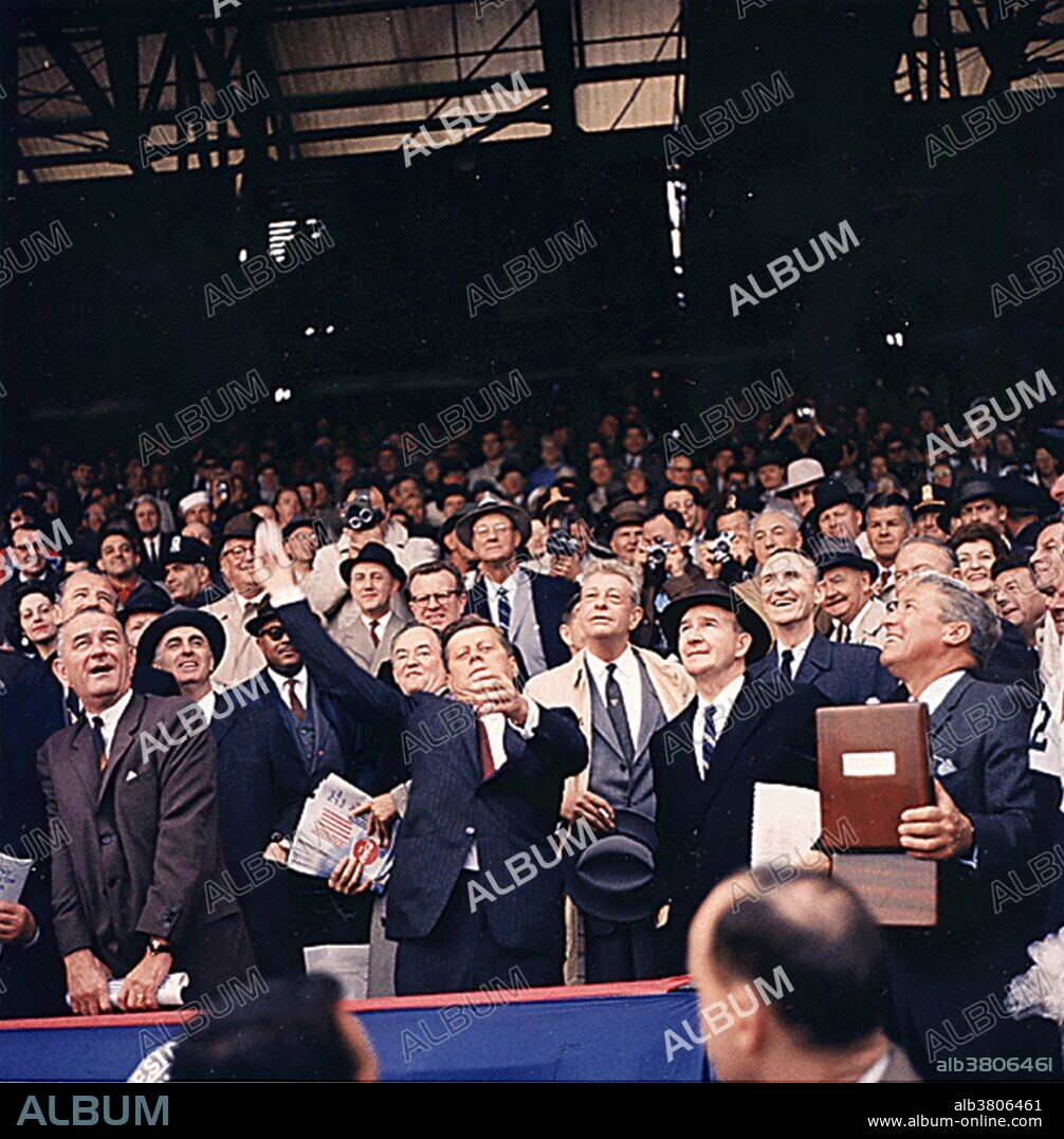 Opening Day of 1961 Baseball Season. President Kennedy throws out first ball. (first row) Vice President Johnson, President Kennedy, Dave Powers, Elwood Quesada. (second row) Secreatry of HEW Abraham Ribicoff, Assistant Press Secretary Andrew Hatcher, Senator Hubert Humphrey, Senator Everett Dirksen, Senator Mike Mansfield. (third row) Lawrence O'Brien, spectators. Washington, D.C., Griffith Stadium, 04/10/1961. John Fitzgerald Kennedy (May 29, 1917 - November 22, 1963) was the 35th President of the United States, serving from 1961 until his death in 1963. He was the youngest elected to the office, at the age of 43, and the first person born in the 20th century to serve as president. He was the only Catholic president, and is the only president to have won a Pulitzer Prize. Events during his presidency included the Bay of Pigs Invasion, the Cuban Missile Crisis, the building of the Berlin Wall, the Space Race, the African-American Civil Rights Movement, creation of the Peace Corps, and early stages of the Vietnam War. Kennedy was assassinated on November 22, 1963 in Dallas, Texas by Lee Harvey Oswald. He continues to rank highly in public opinion ratings of US presidents.