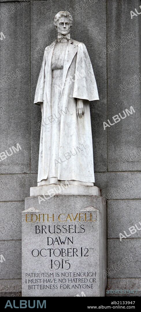 Memorial statue of Edith Cavell, British nurse and patriot. Set at Saint Martin's Place in London, England. Made of White marble against a tall granite cross. Made by Sir George Frampton and unveiled in 1920 (Photo by: Universal History Archive/UIG via Getty Images).