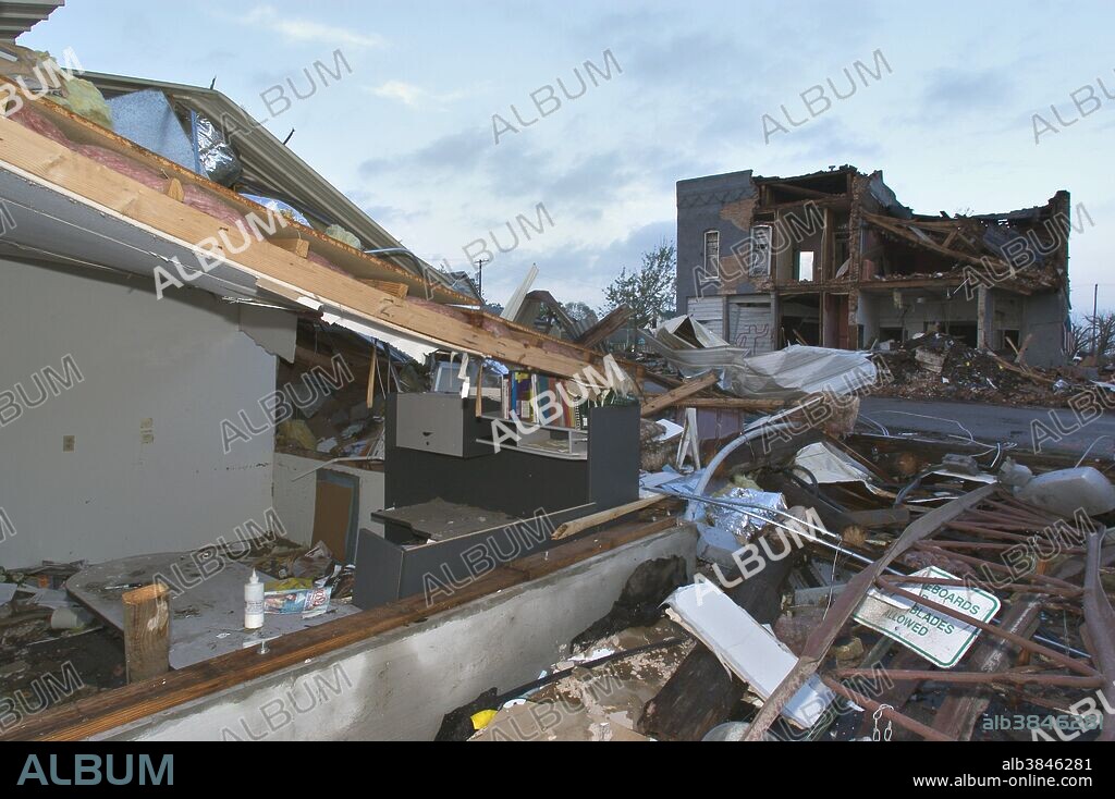 An F3 twister damaged or destroyed numerous buildings in Pierce City, Missouri during an outbreak of 94 tornadoes on May 4, 2003. Despite winds of close to 200 miles per hour, a few belongings in this crushed office space remained untouched. The central United States experienced a record-breaking 516 tornadoes during the month of May 2003.
