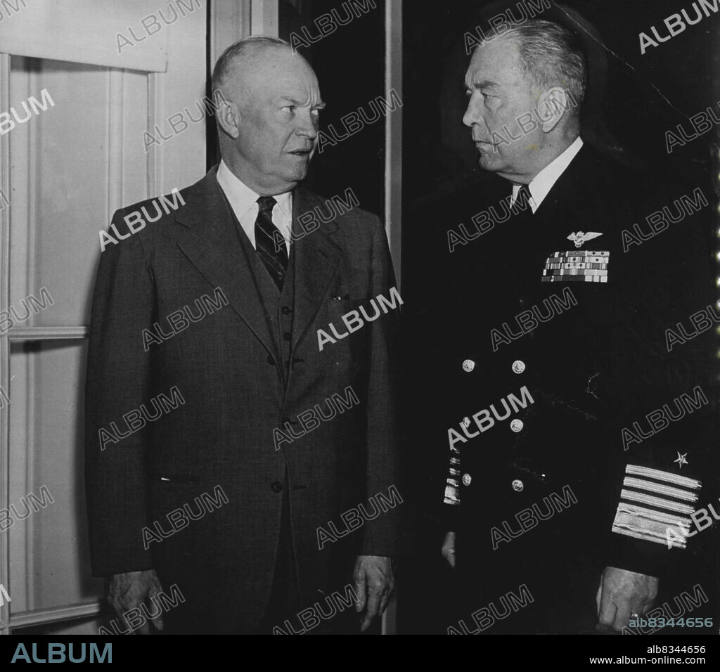 American Personalities: Admiral Arthur W. Radford With President Eisenhower in President Eisenhower's office on the return of Admiral Radford from his round-the-world inspection trip. February 10, 1955. (Photo by Camera Press).