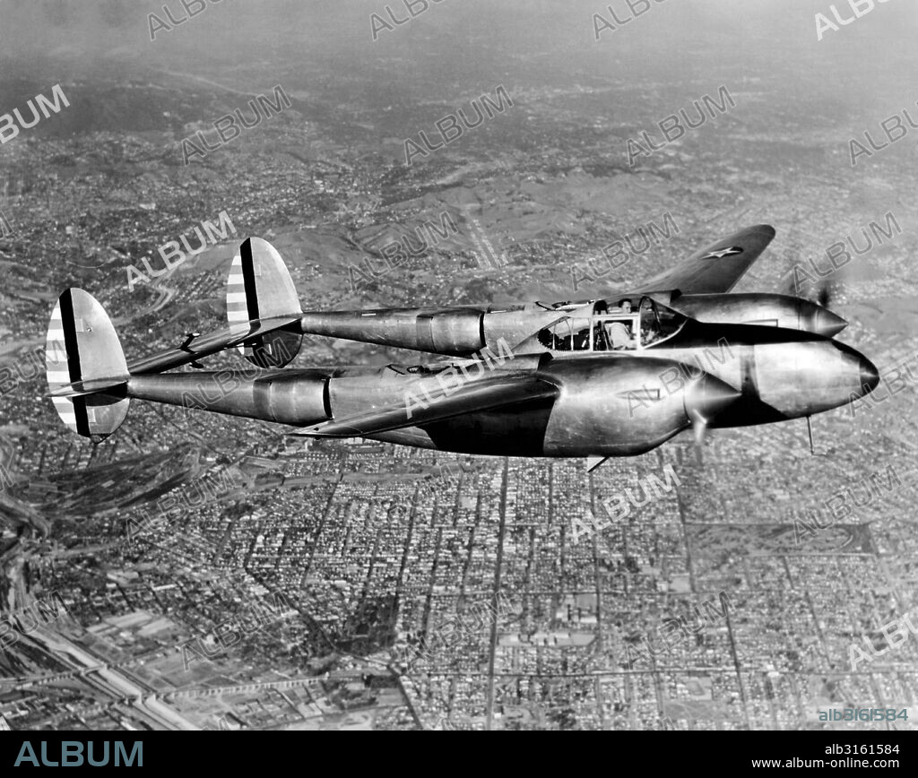 United States: 1940 An in flight view of a Lockheed P-38 Lightning fighter used by the U. S. Army Air Force.