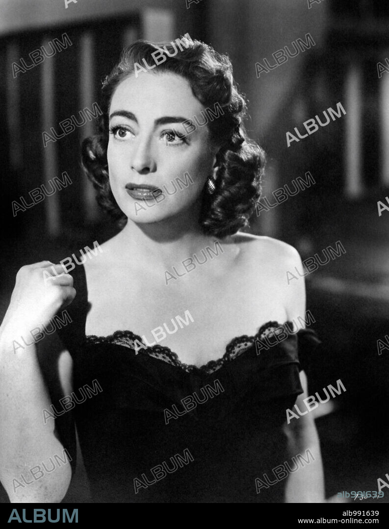 JOAN CRAWFORD in THE DAMNED DON'T CRY, 1950, directed by VINCENT SHERMAN. Copyright WARNER BROTHERS.