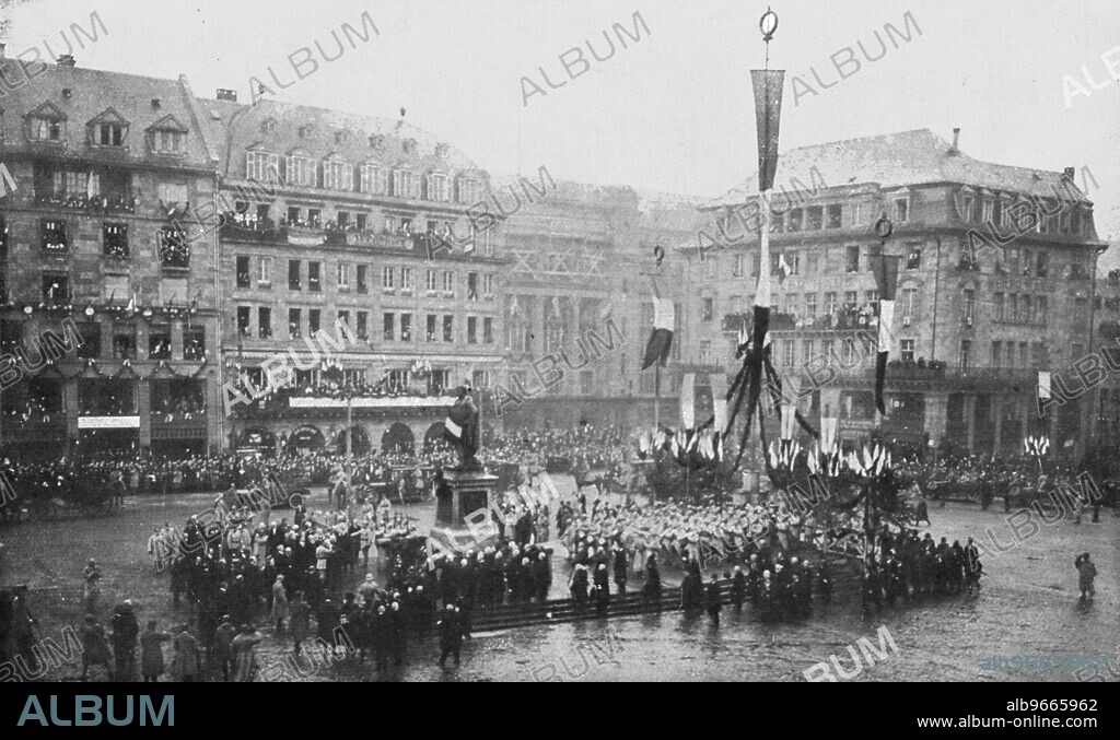 'Les fetes du 9 decembre 1918 a Strasbourg; Le President de la Republique depose une gerbe de roses devant la statue de Kleber', 1918. From "L'Album de la Guerre 1914-1919, Volume 2" [L'Illustration, Paris, 1924].