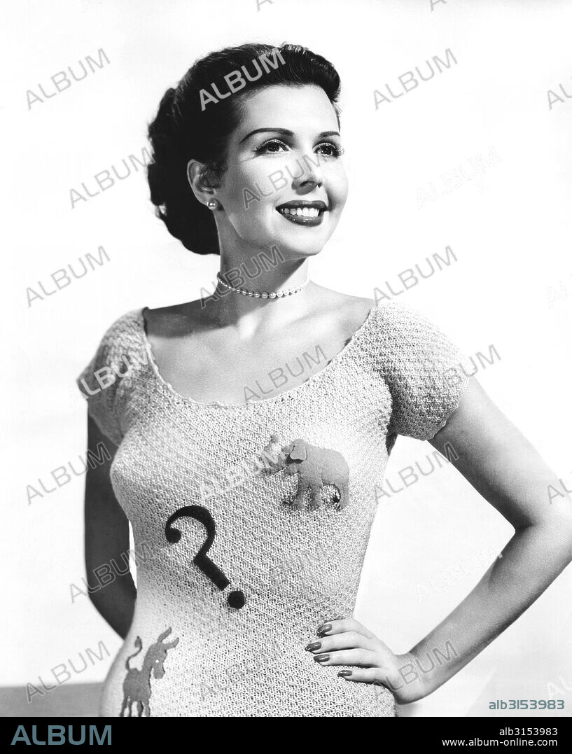 Hollywood, California: July 9, 1952 Actress and dancer Ann Miller displays her dilemma with the Democrats and Republicans this election year.