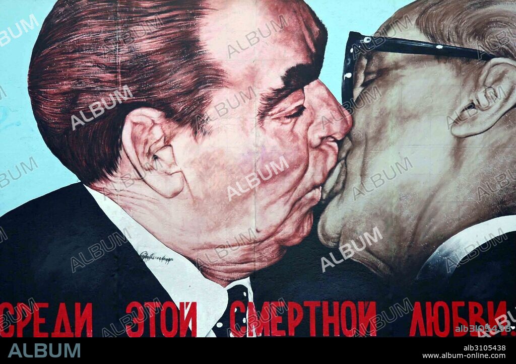 Mural on the Berlin Wall, by Russian artist Dimitry Vrubel, 1990, showing Soviet leader leonid Brezhnev kissing East German leader Honecker.