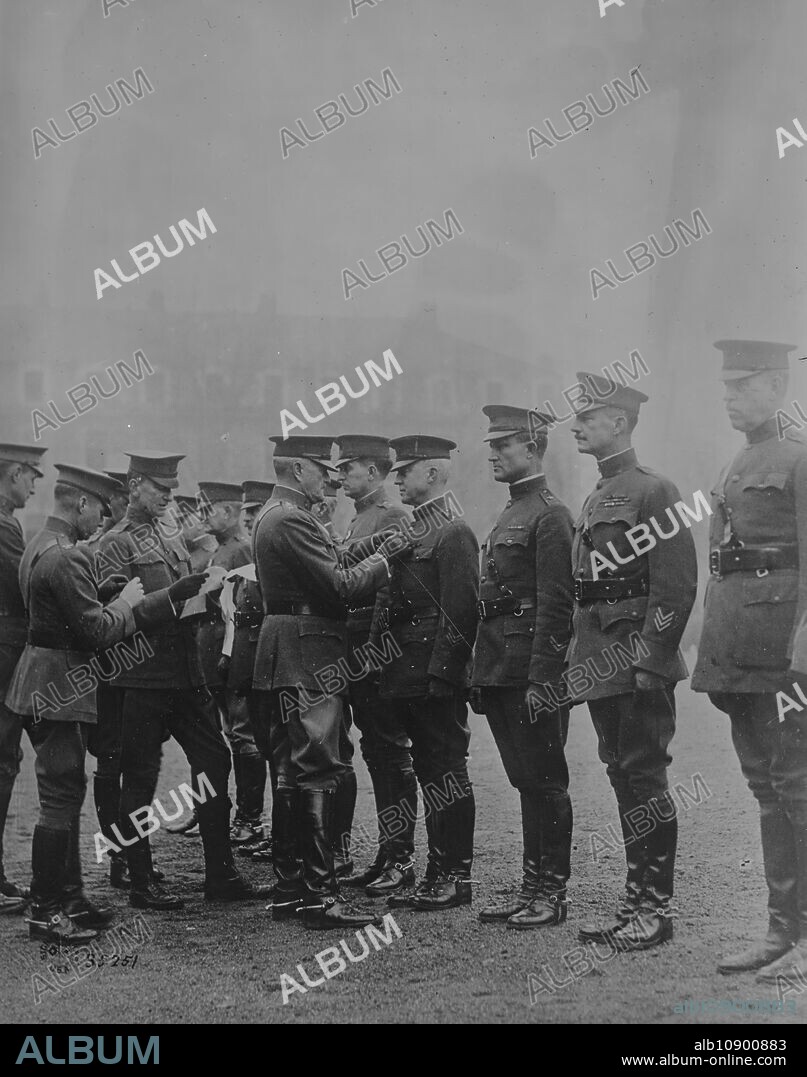 BAIN NEWS SERVICE. Pershing decorating Americans, Feb 1919 (date created or published later). United States General John J. Pershing (1860-1948), head of the American Expeditionary Forces in World War I, decorating American soldiers.