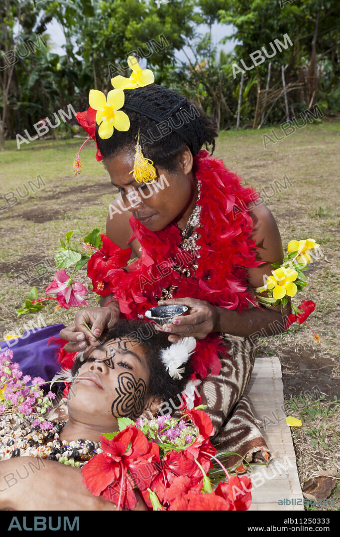 Demonstration of traditional Facial Tattoo, Tufi, Oro Province, Papua New Guinea.